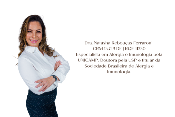 Retrato profissional da Dra. Natasha Rebouças Ferraroni, especialista em Alergia e Imunologia, com postura confiante e sorriso acolhedor.