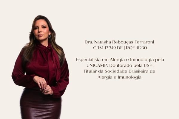 Retrato profissional da Dra. Natasha Rebouças Ferraroni, especialista em Alergia e Imunologia, com postura confiante e sorriso acolhedor.