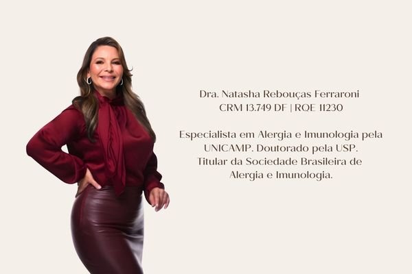 Retrato profissional da Dra. Natasha Rebouças Ferraroni, especialista em Alergia e Imunologia, com postura confiante e sorriso acolhedor.